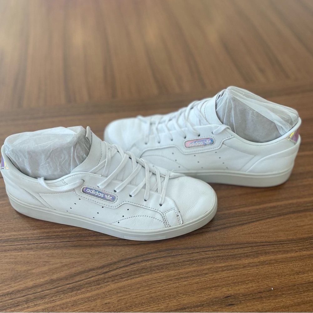 Woman’s Adidas tennis shoes 
**Woman’s size 9